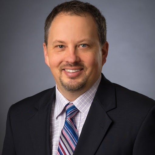 Headshot of Greg Korn