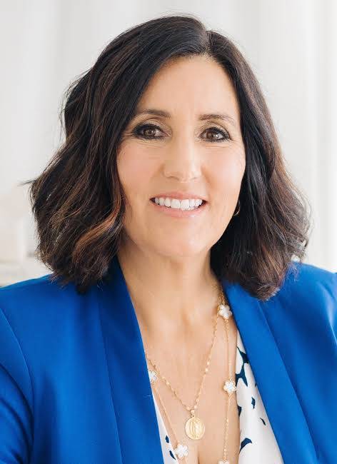 Tamara McCormic standing in her office, owner and founder of GoLegal