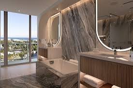 Marble bathroom with ocean view at Pier Sixty-Six