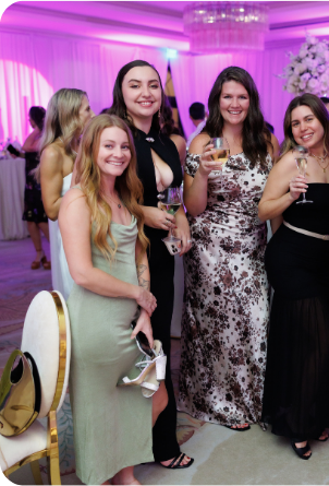 Guests with champagne at the Soft Girl Millions after party