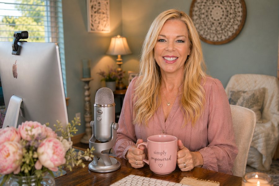 Debra at her desk, simply empowered