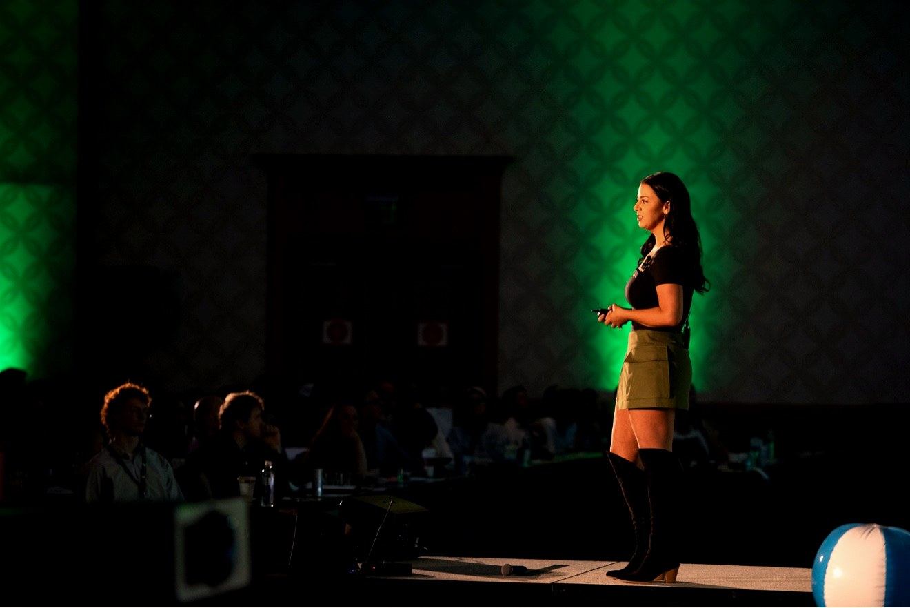Dr. Elise Rigney speaking on stage