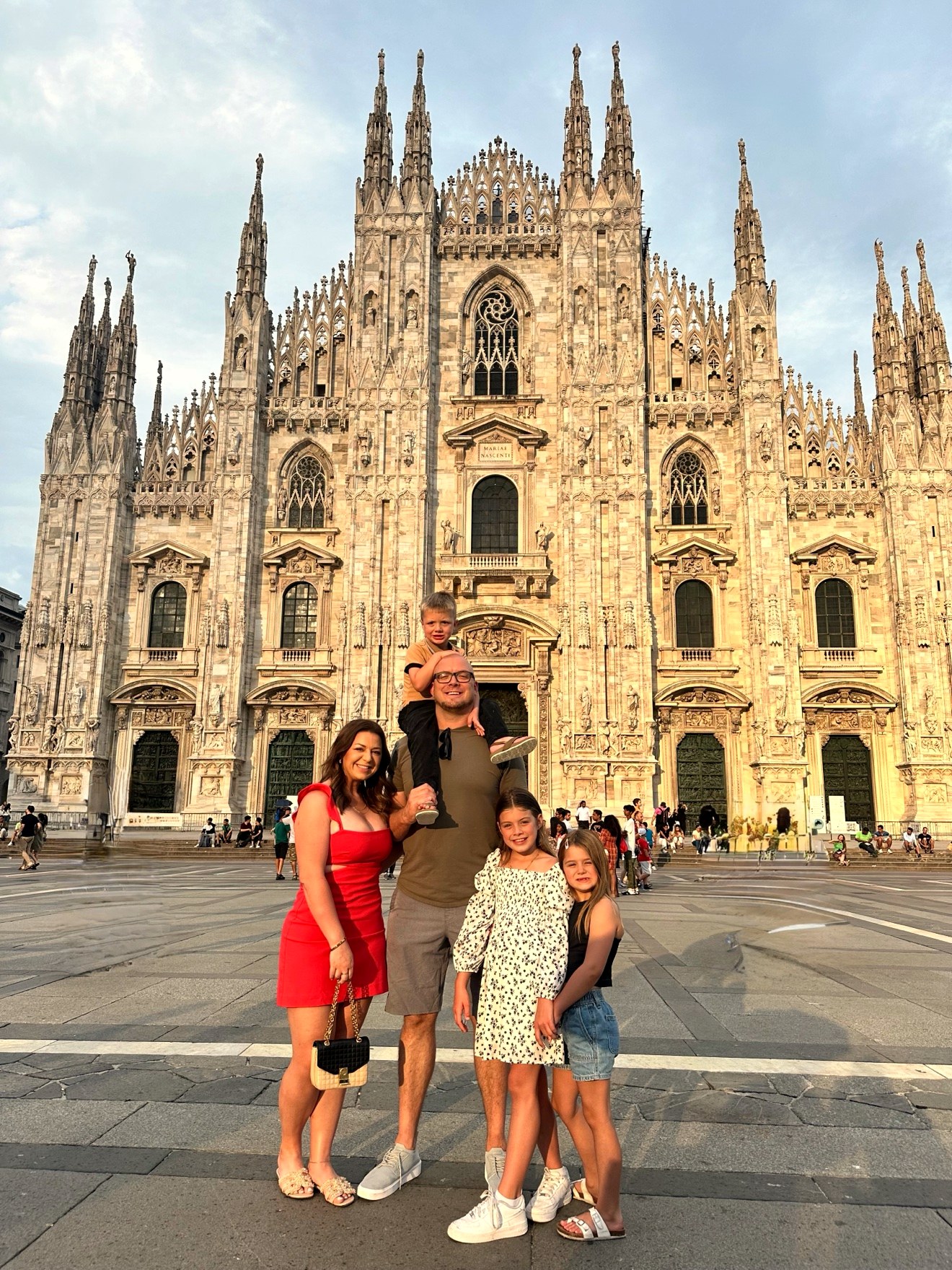 Dr. Elise with her husband and three kids traveling in Milan, Italy