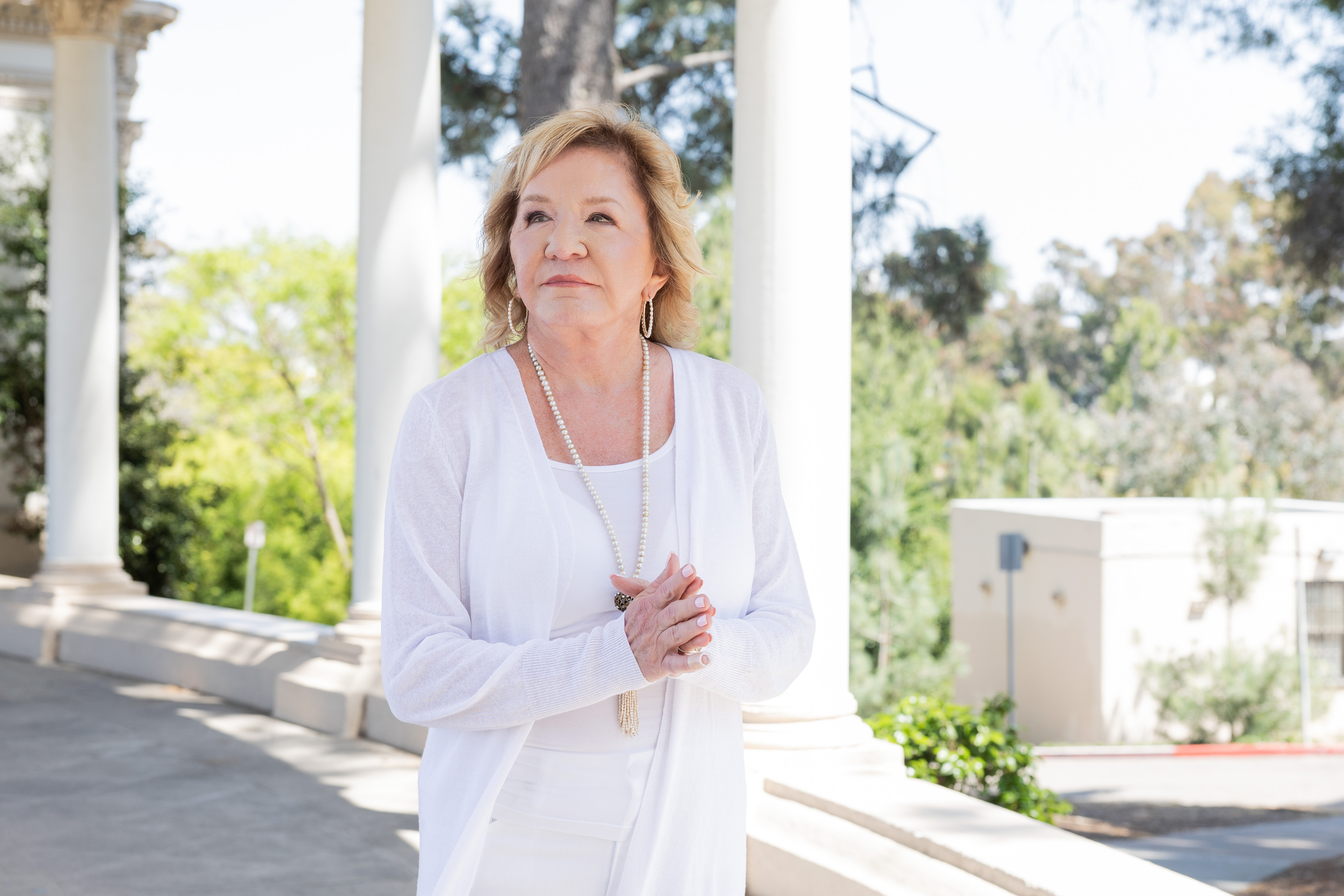Deb among white columns
