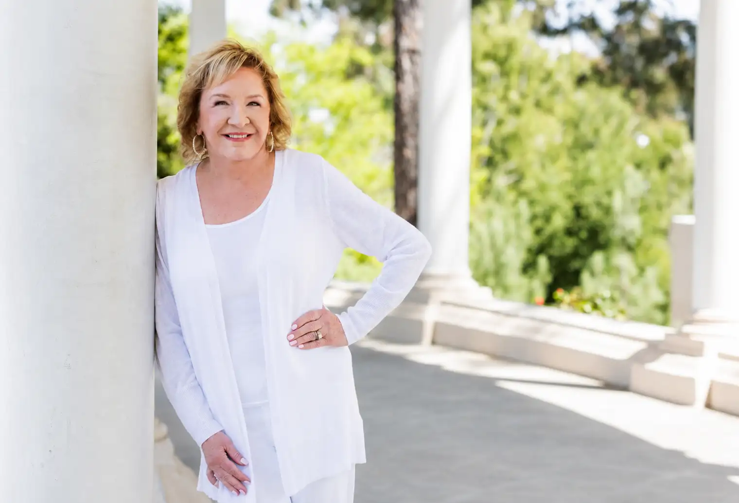 Deb Sheppard smiling warmly in natural light