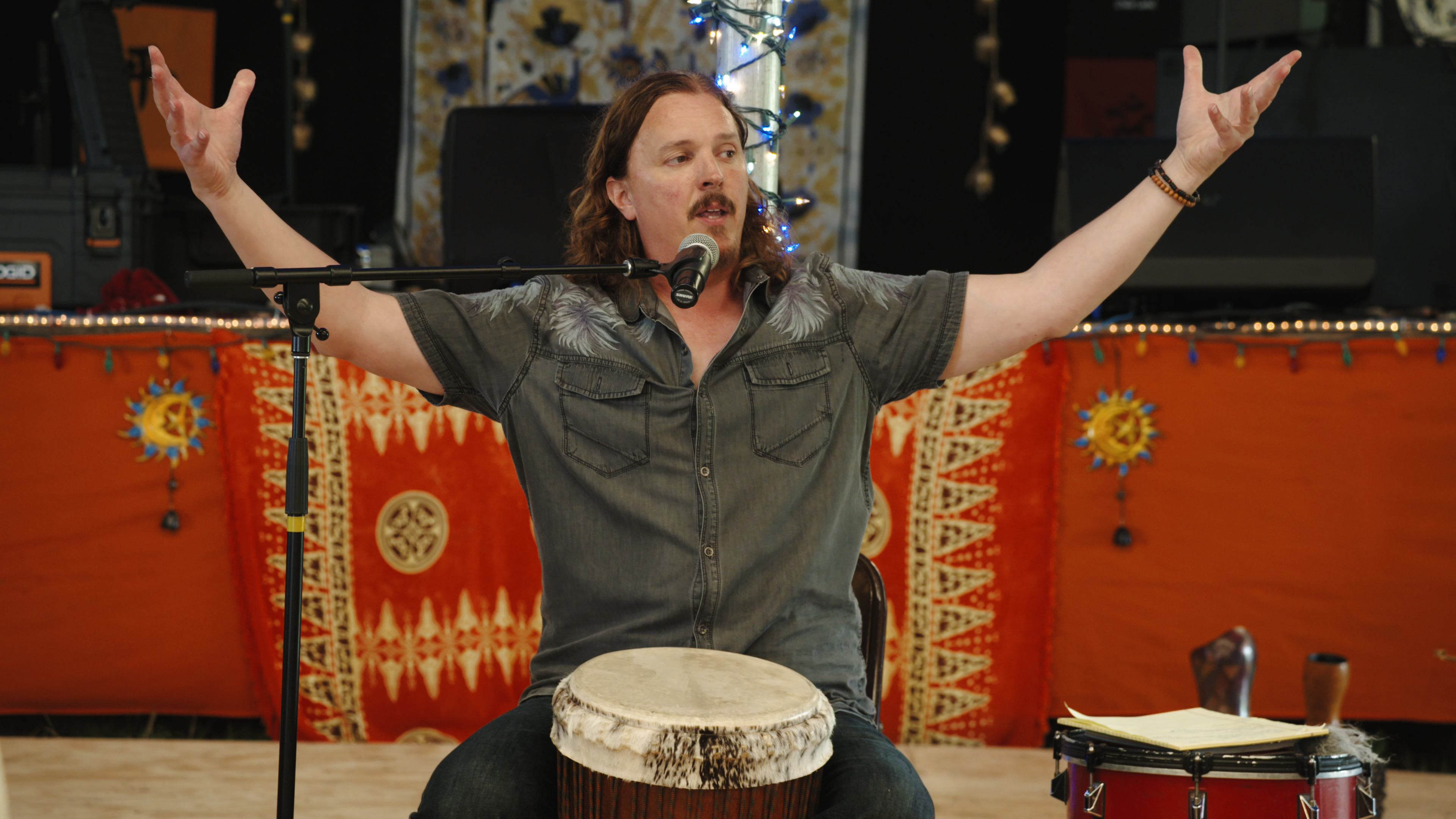 Jim Donovan leading an audience in sound healing