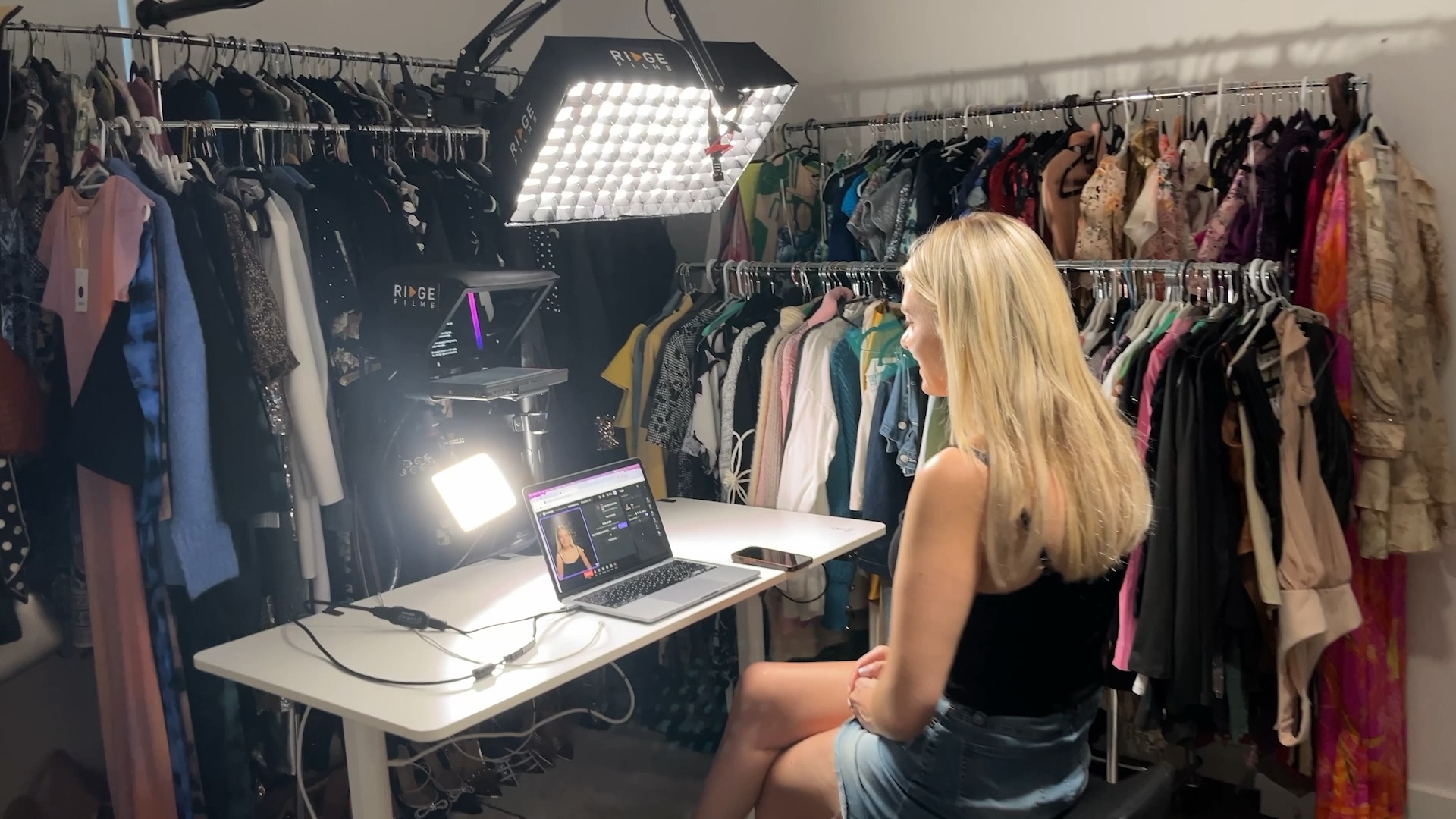 A Desktop Studio installed in a wardrobe room surrounded by clothing rails