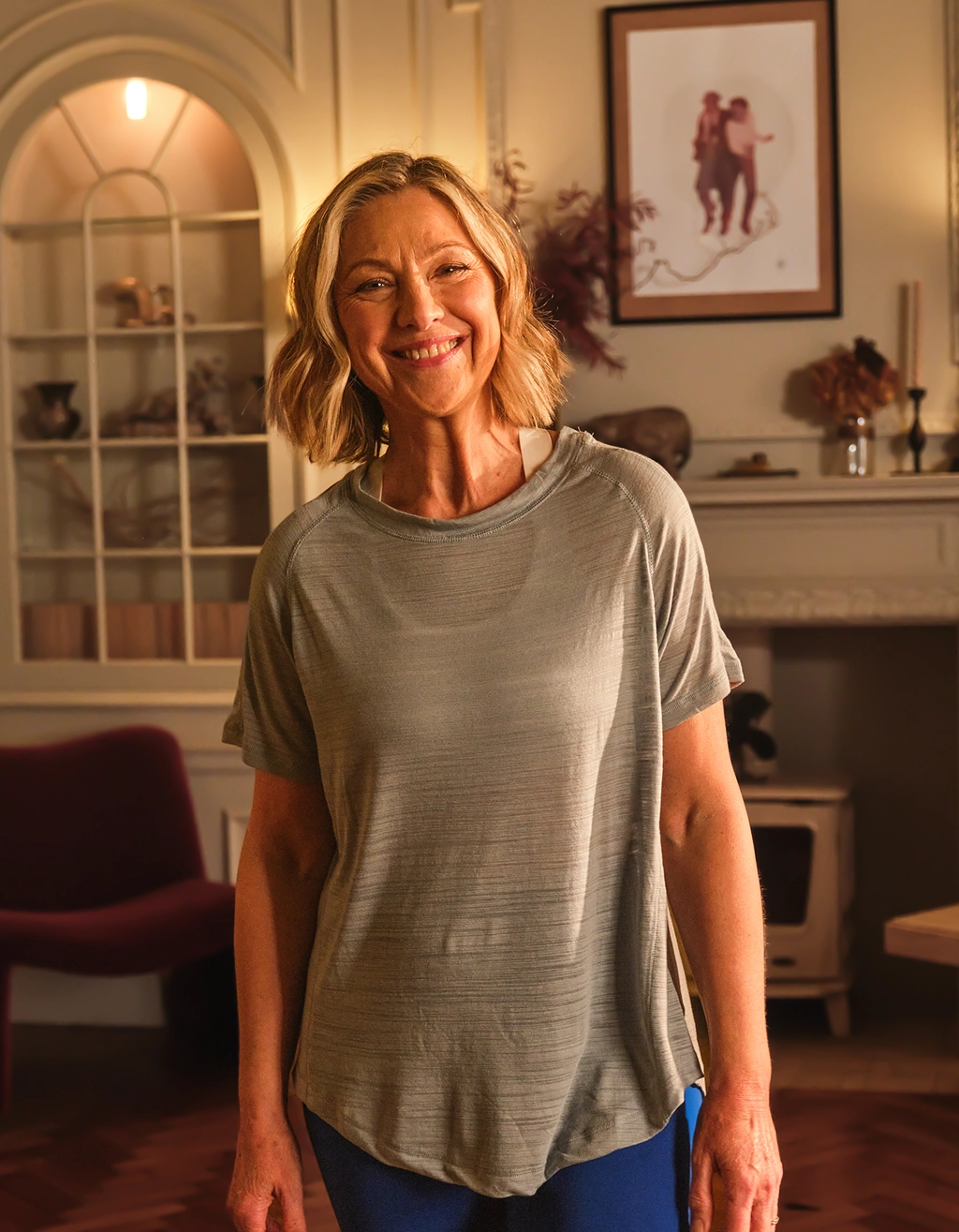 A woman over 50 exercising at home with the Get In Goodnick 9-week programme