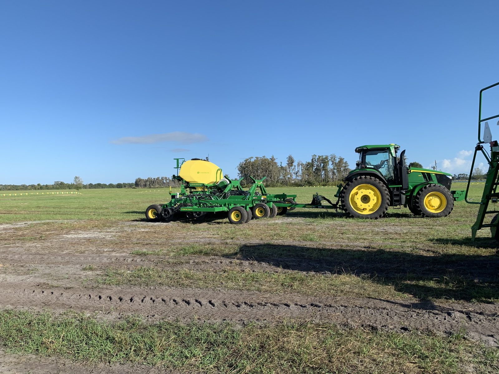A John Deere tractor and N536 seeding implement.