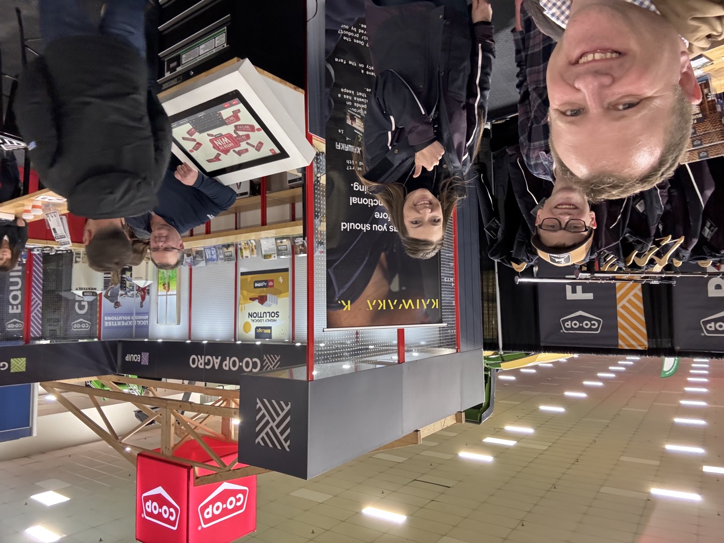 Connecting at the Co-op Agro booth, with Kaiwaka apparel on display.