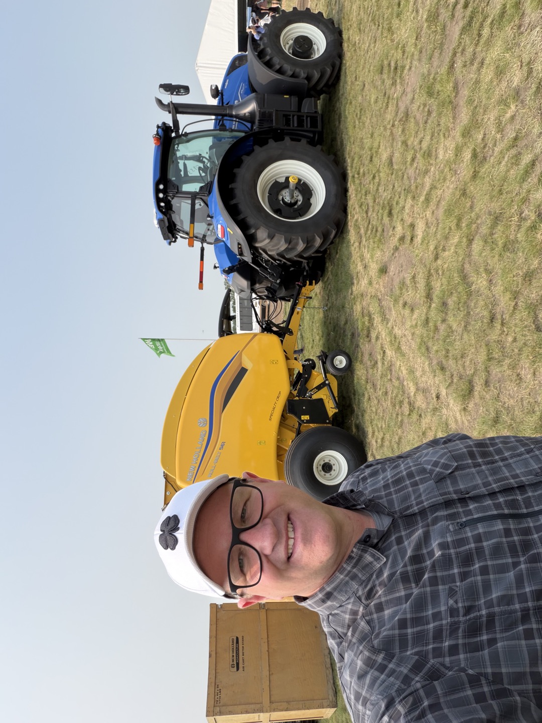 A New Holland tractor and baler on display.