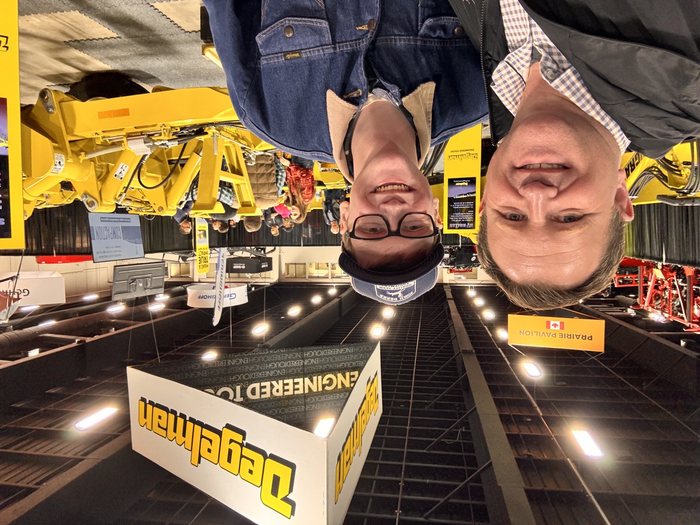 A moment together at the Degelman display.