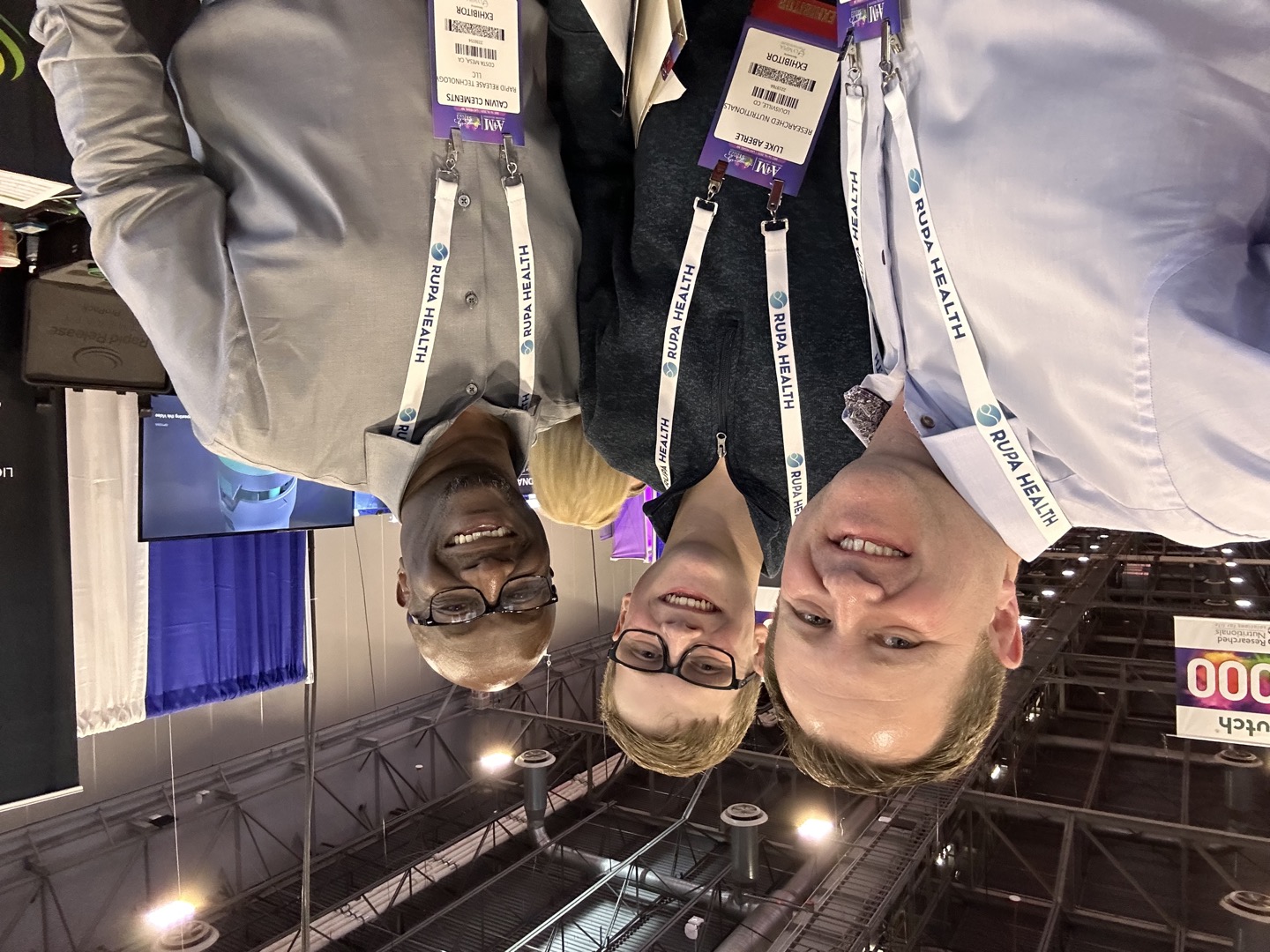 A group photo on the exhibit floor at A4M 2023.