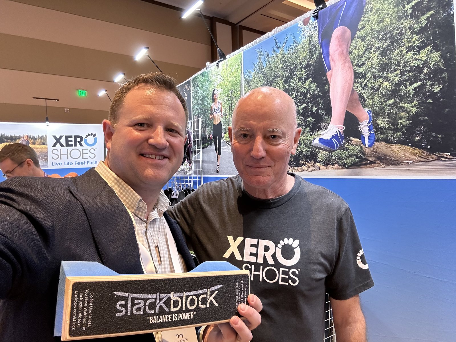 At the Xero Shoes exhibit, with a SlackBlock balance board.