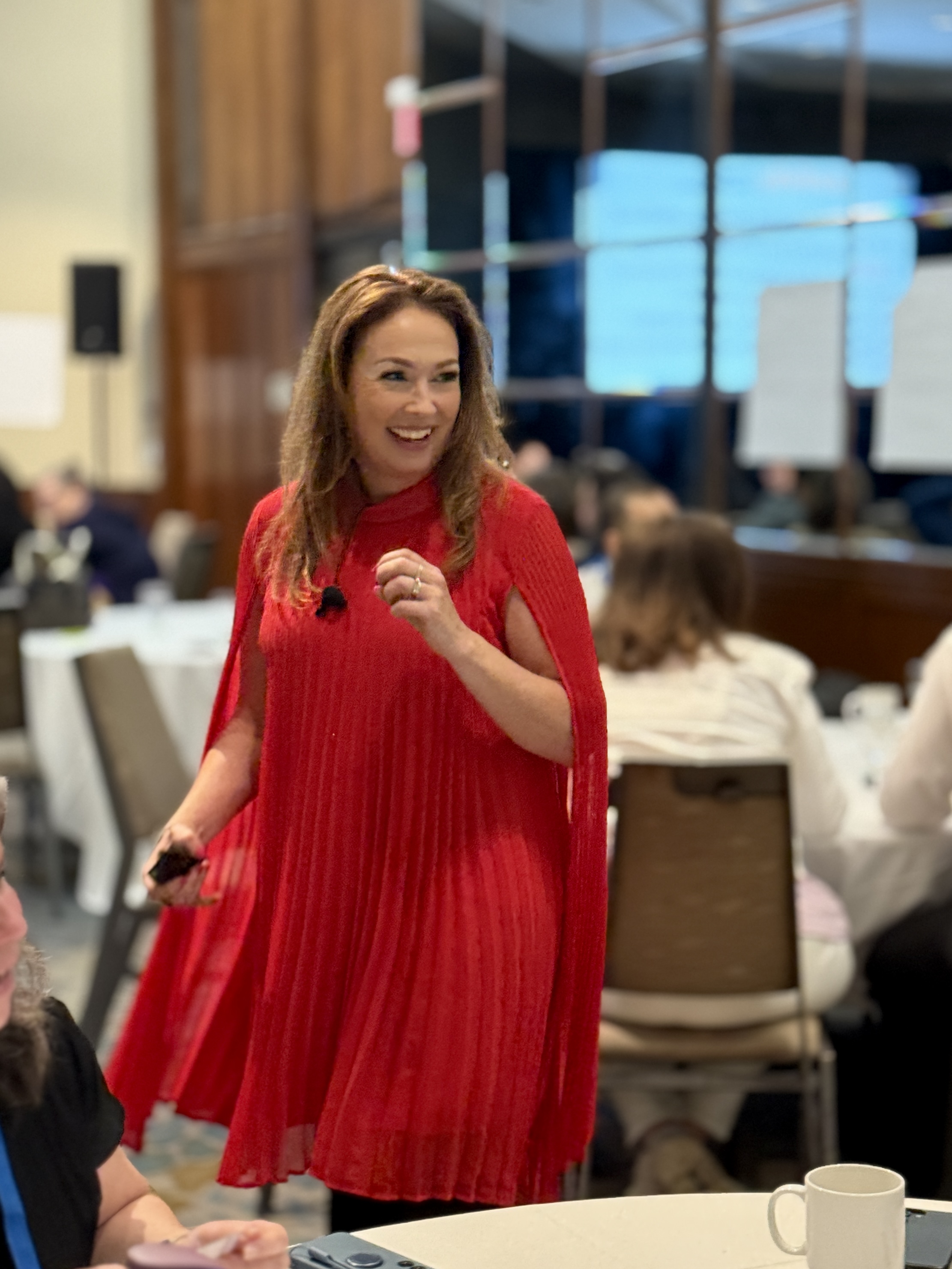 Jennifer Krueger speaking at conference