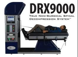 DRX9000 non-surgical spinal decompression table for recurring low back pain