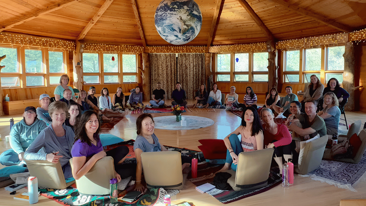 Energy Matters retreat participants meditating together inside The StarHouse in Boulder