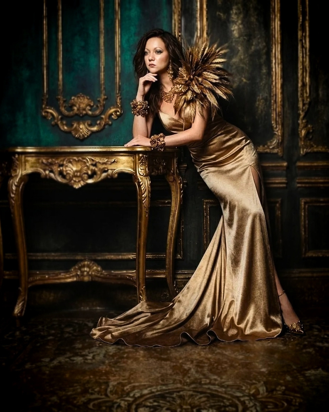 A Manifestor woman in gold, contemplative, leaning on a gilded table