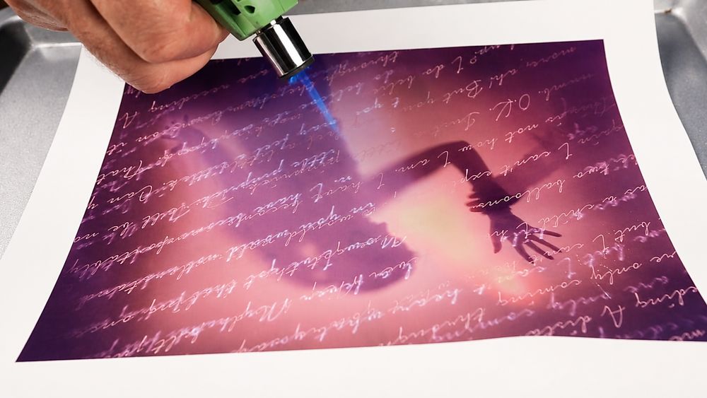 Photographic print worked with heat and emulsion