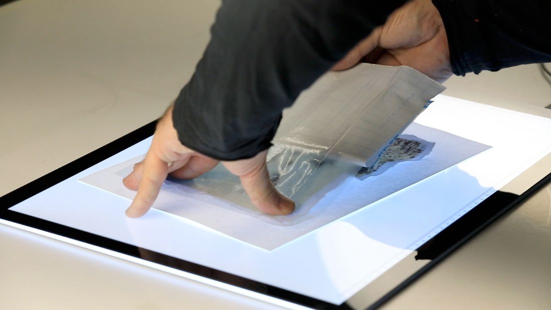 Lifting an image with solvent and light on a lightbox