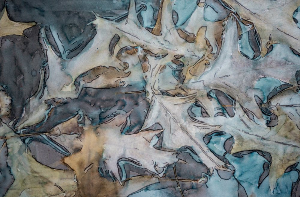 Water and leaves worked into a blue and white abstract