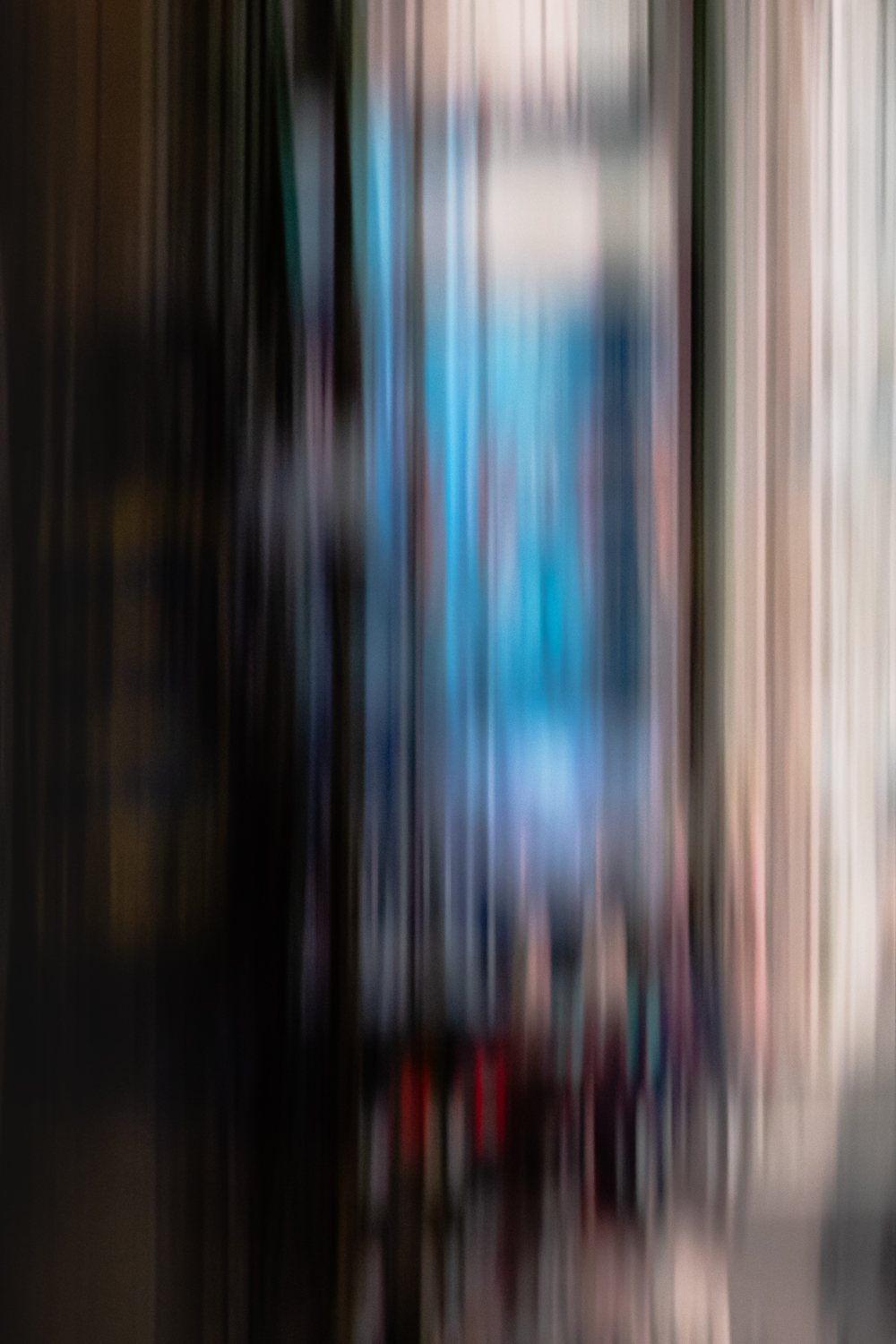 City Life 2, a deep doorway framing a shaft of blue light, drawn into long vertical strokes
