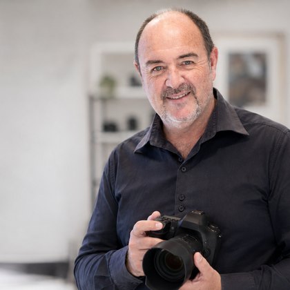 Martin Osner with a camera in his studio