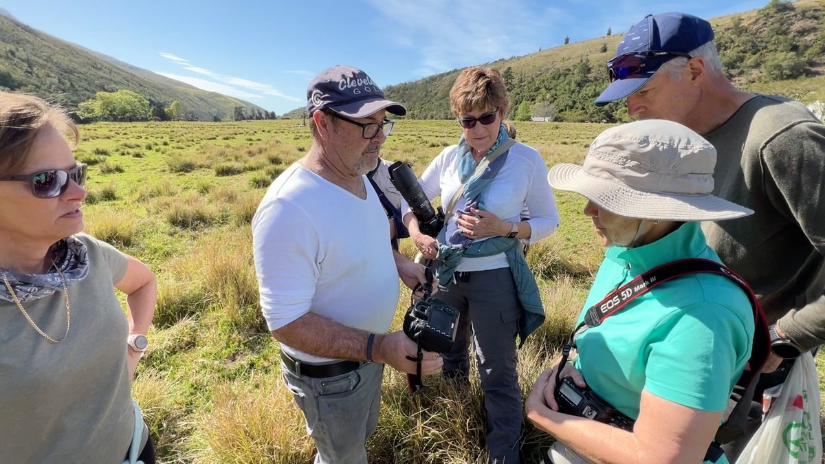 Martin talking with a small group of photographers out in the field