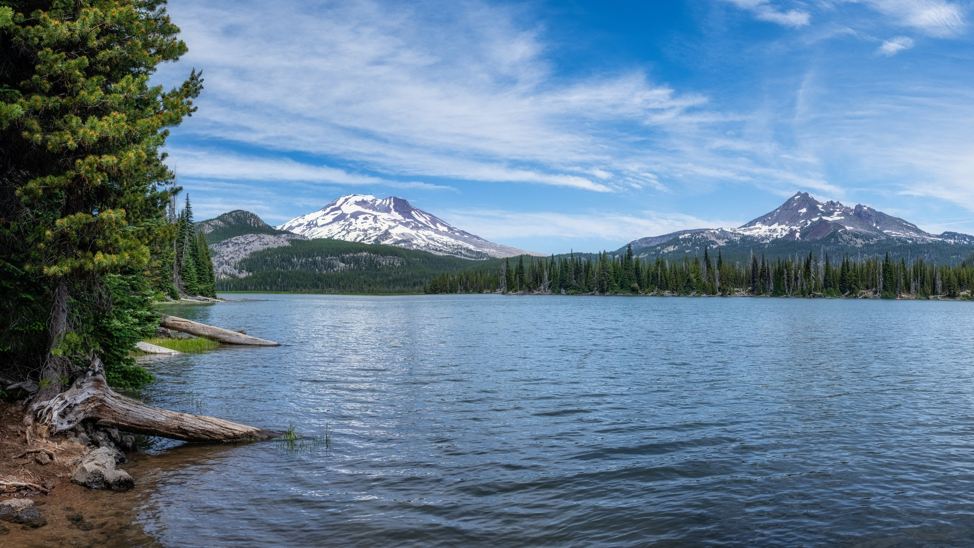 Lake and mountains near forest