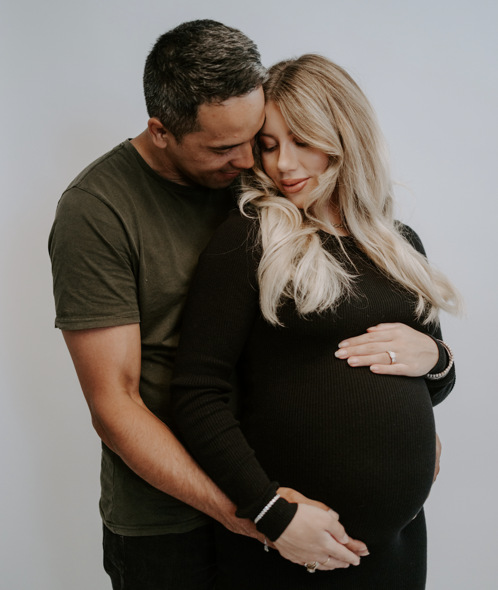 Pregnancy photography alongside reproductive health education