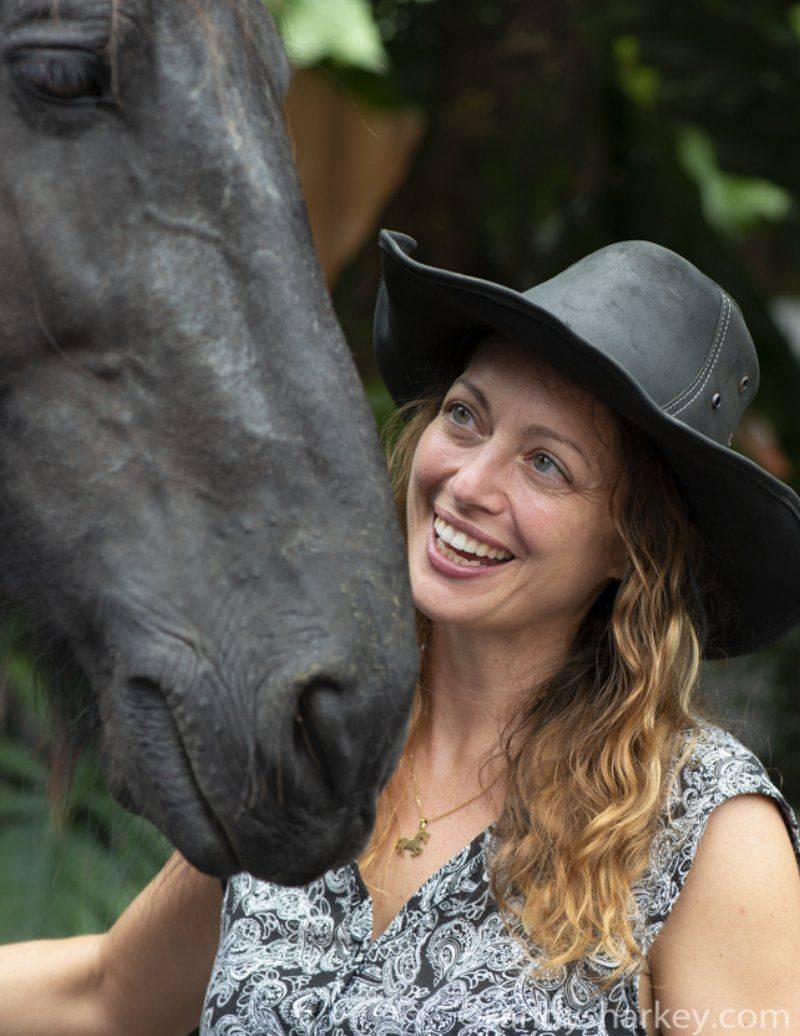 Sally Nilsson with a horse from the Tula Vida herd
