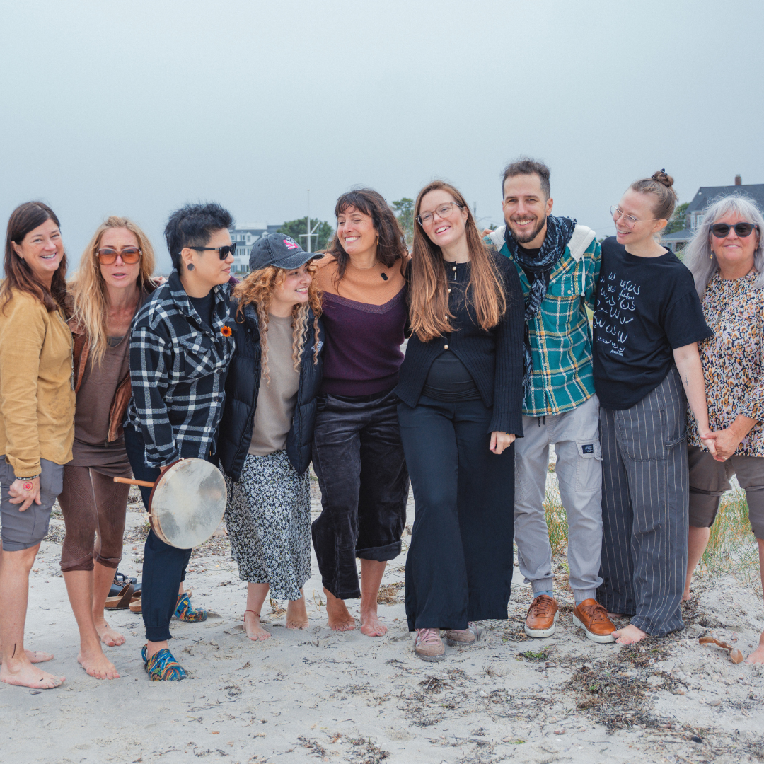 The group together on the beach