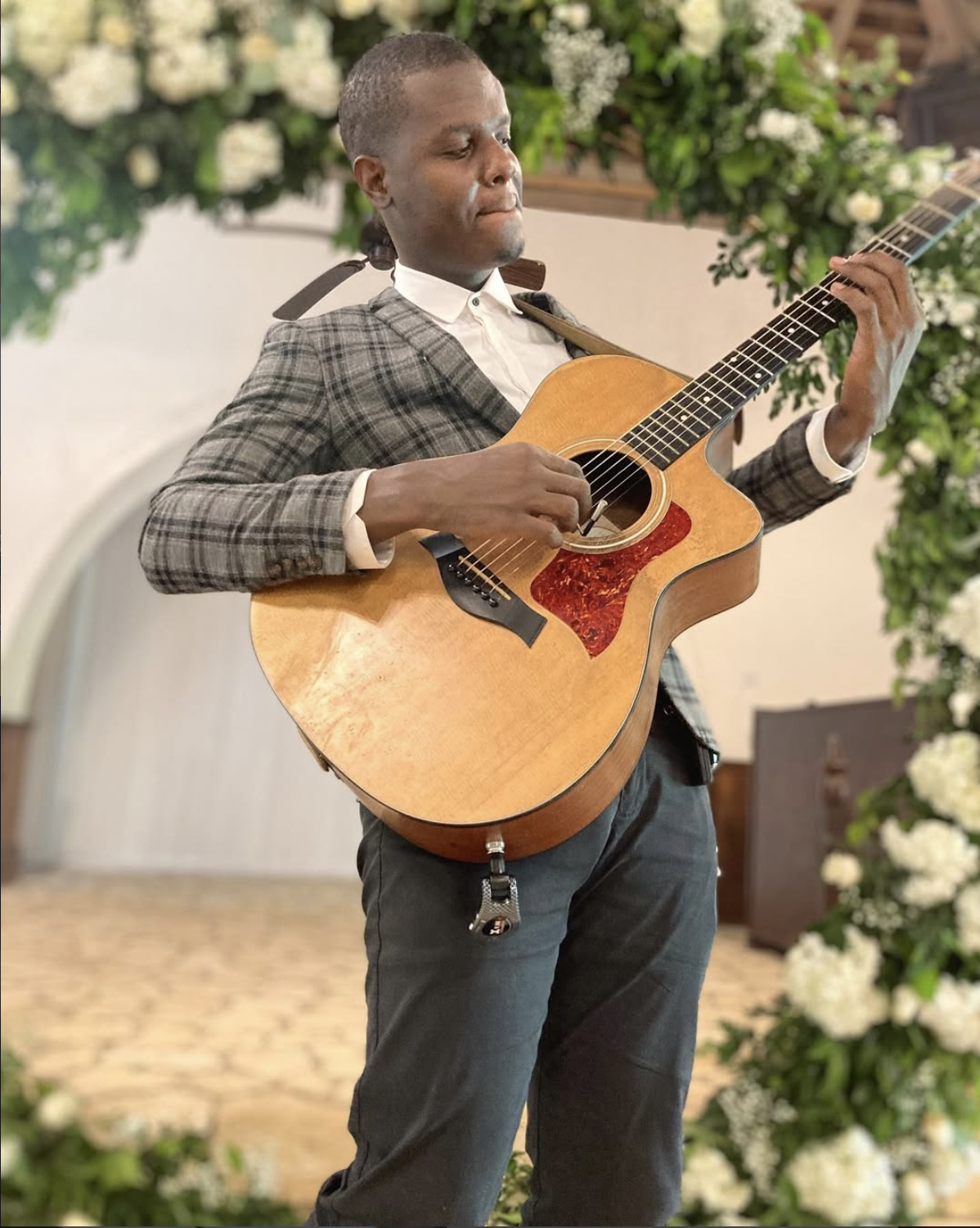Jamaican wedding guitarist performing at a destination wedding