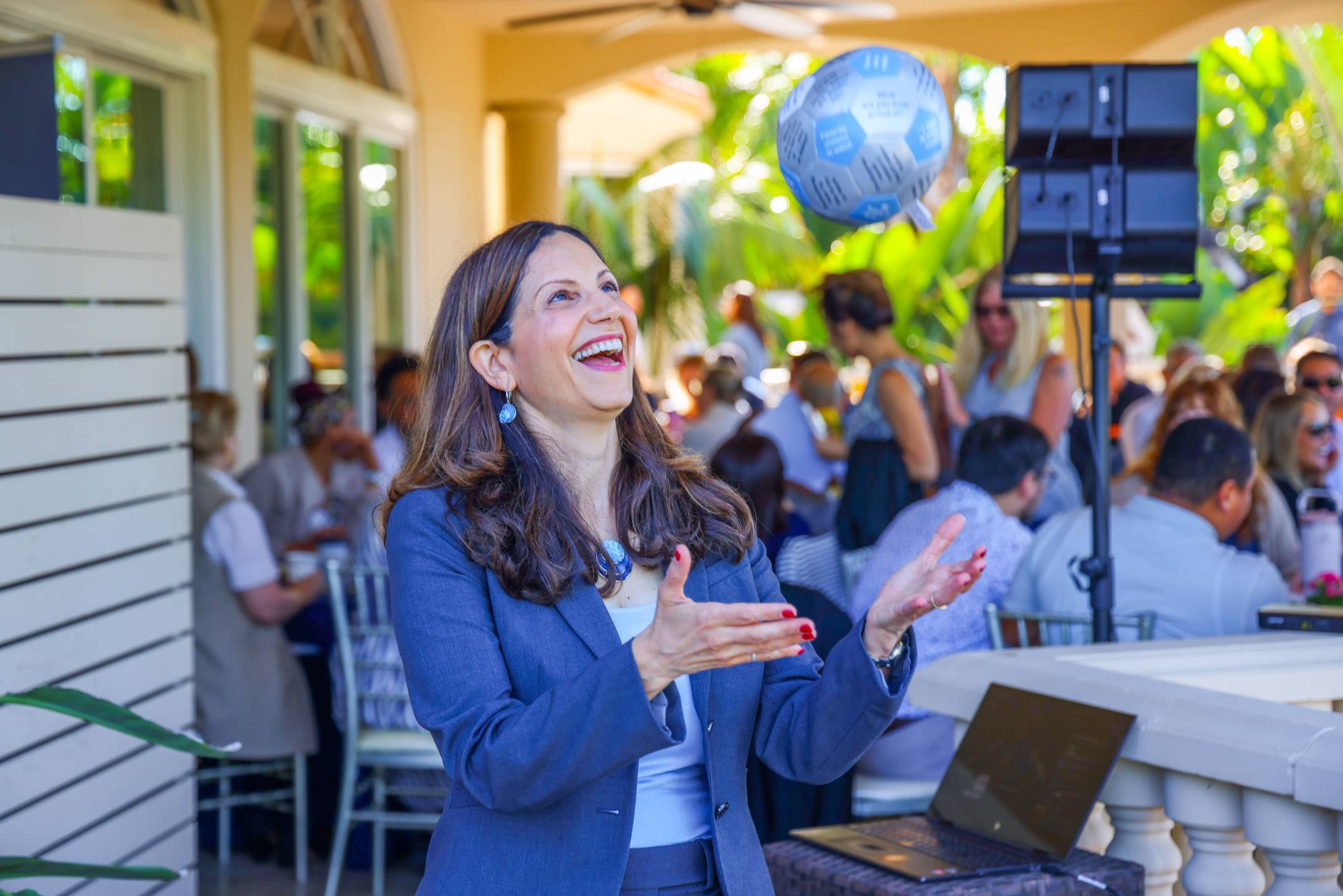 Vered Kogan engaging an audience during a keynote