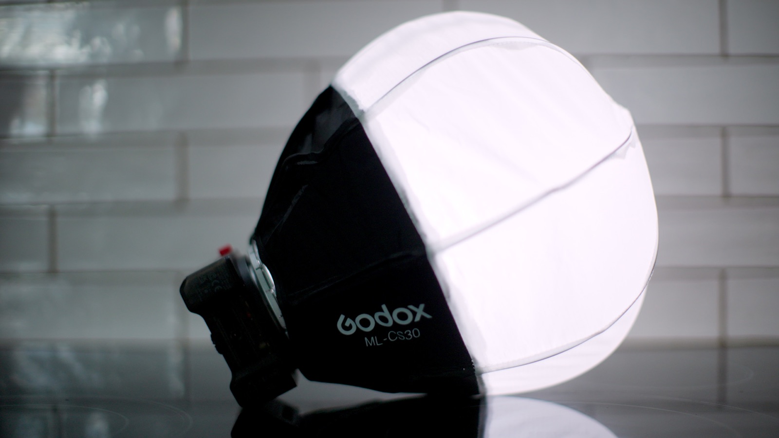Godox ML40R travel light fitted with the compact ML-CS30 lantern
