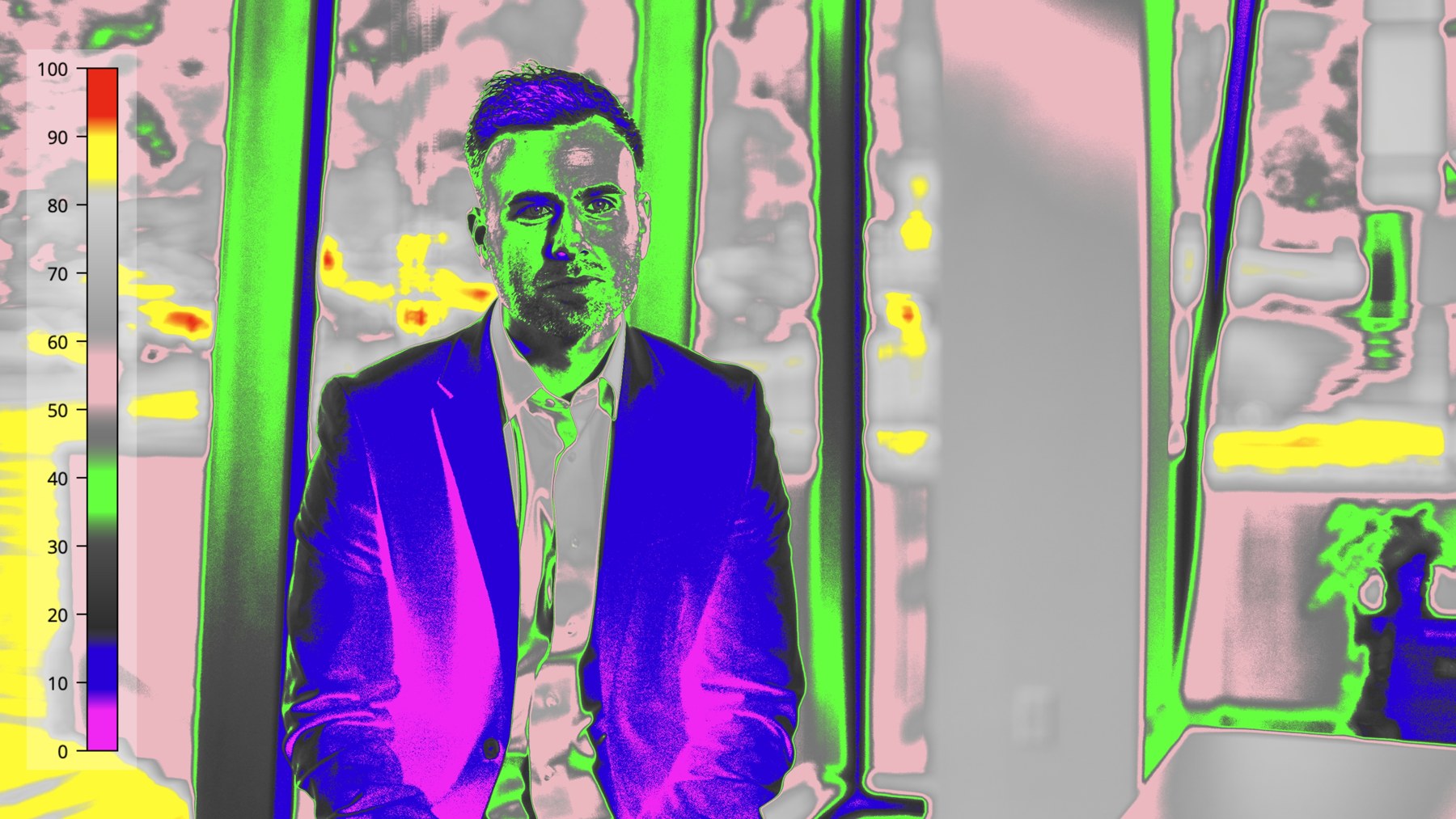 False-color view of the window-key interview showing exposure separation across the subject’s face
