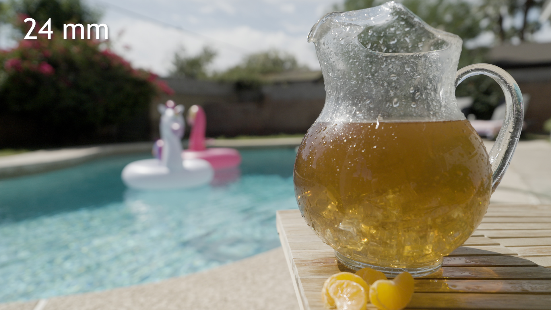 Pitcher photographed at 24mm with a wide view of the pool and background