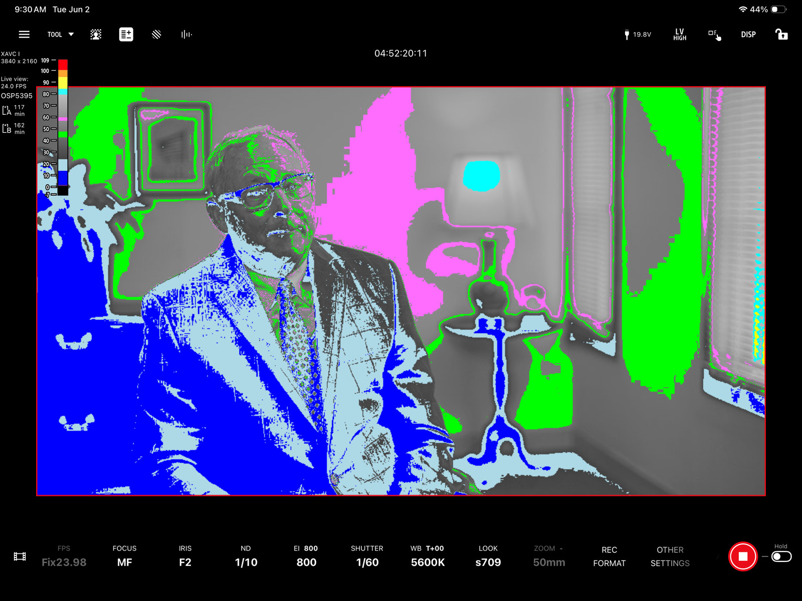 False-color monitor display used to evaluate exposure on a corporate interview