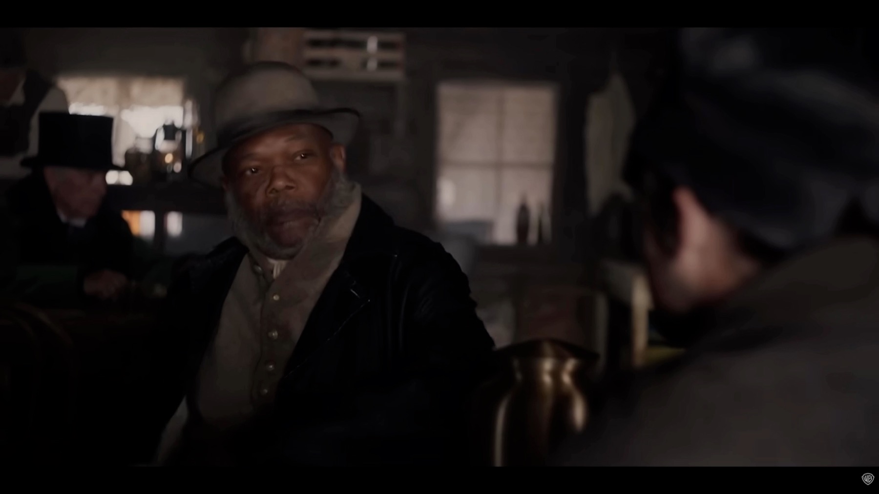 Samuel L. Jackson framed between windows in the outpost sequence from The Unholy Trinity