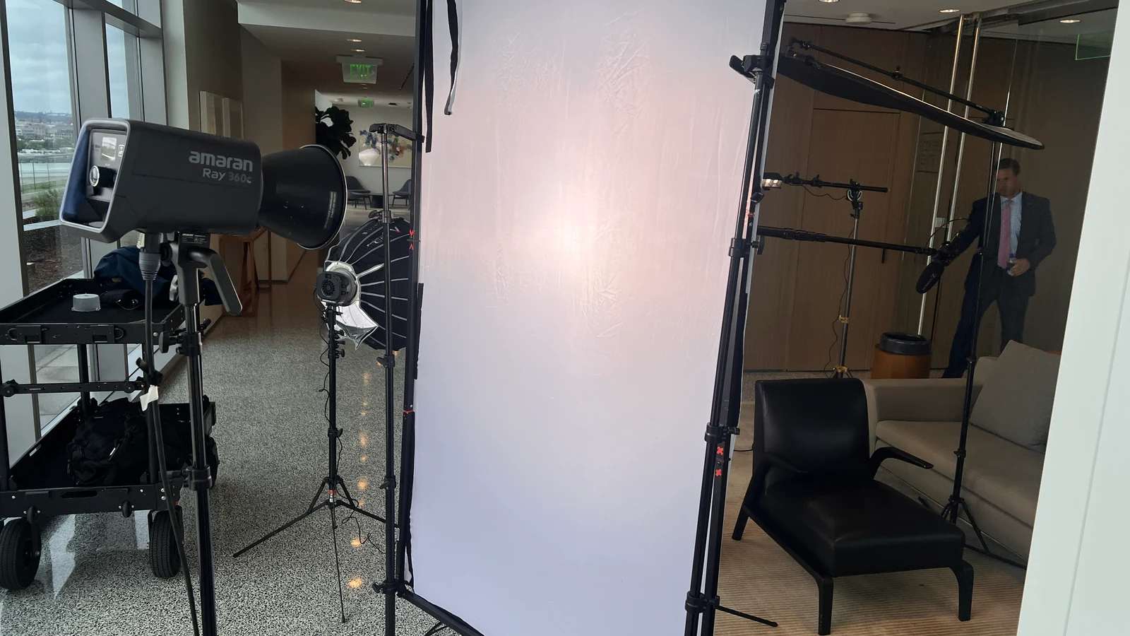 Four-by-six-foot vertical diffusion frame positioned beside an interview chair