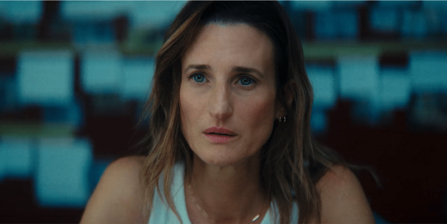 Close-up from the Call My Agent movie showing controlled contrast, cool color separation, and shallow depth of field