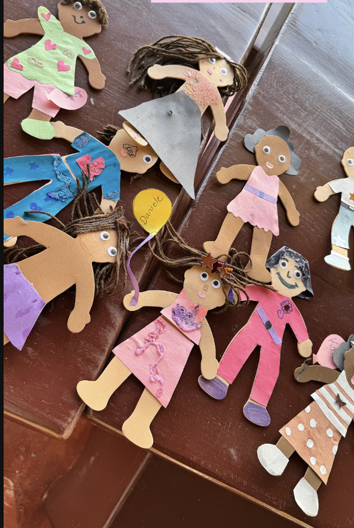 Handmade paper dolls made during the fellowship