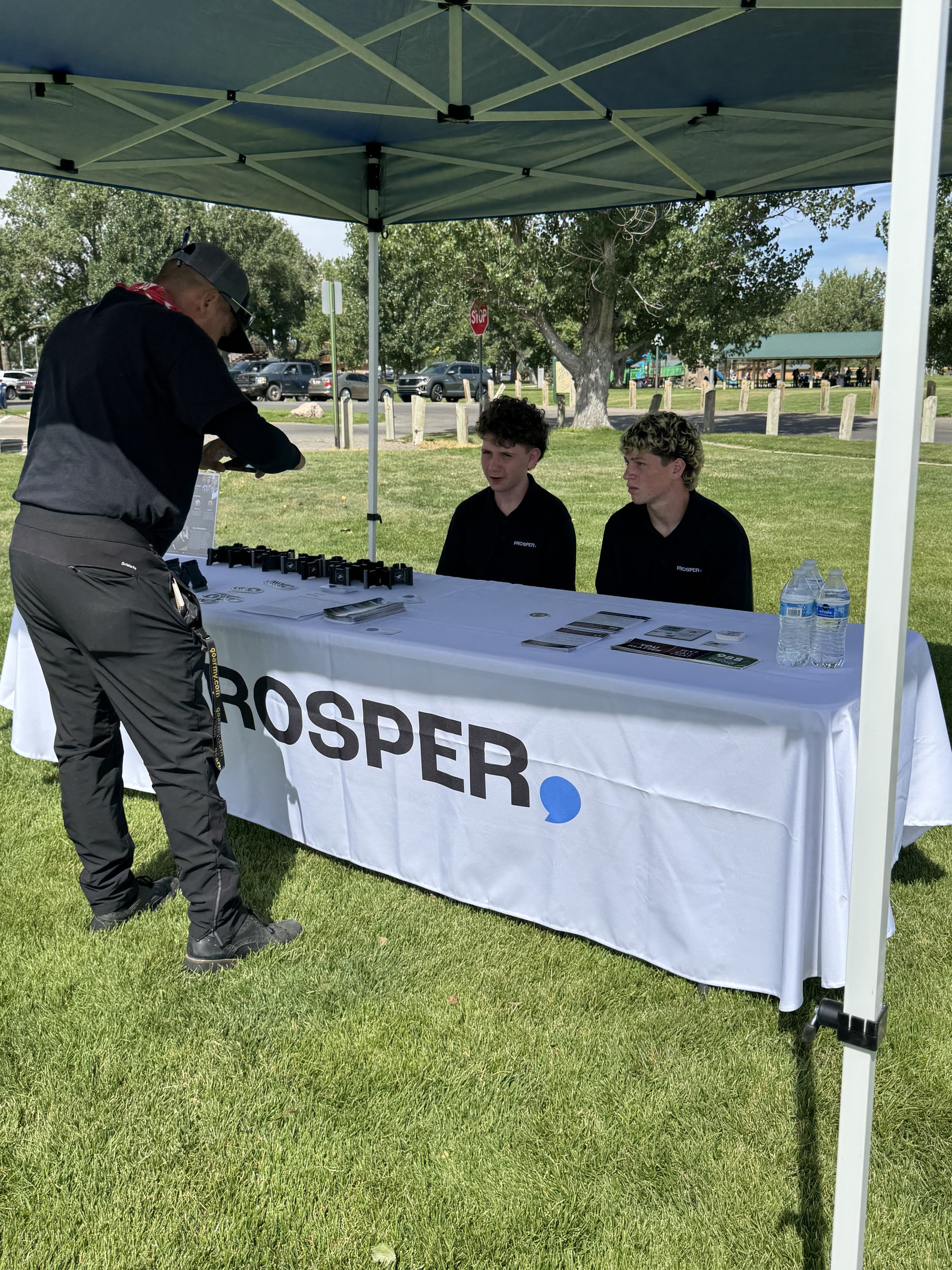 Dean and William welcoming visitors at the PROSPER table