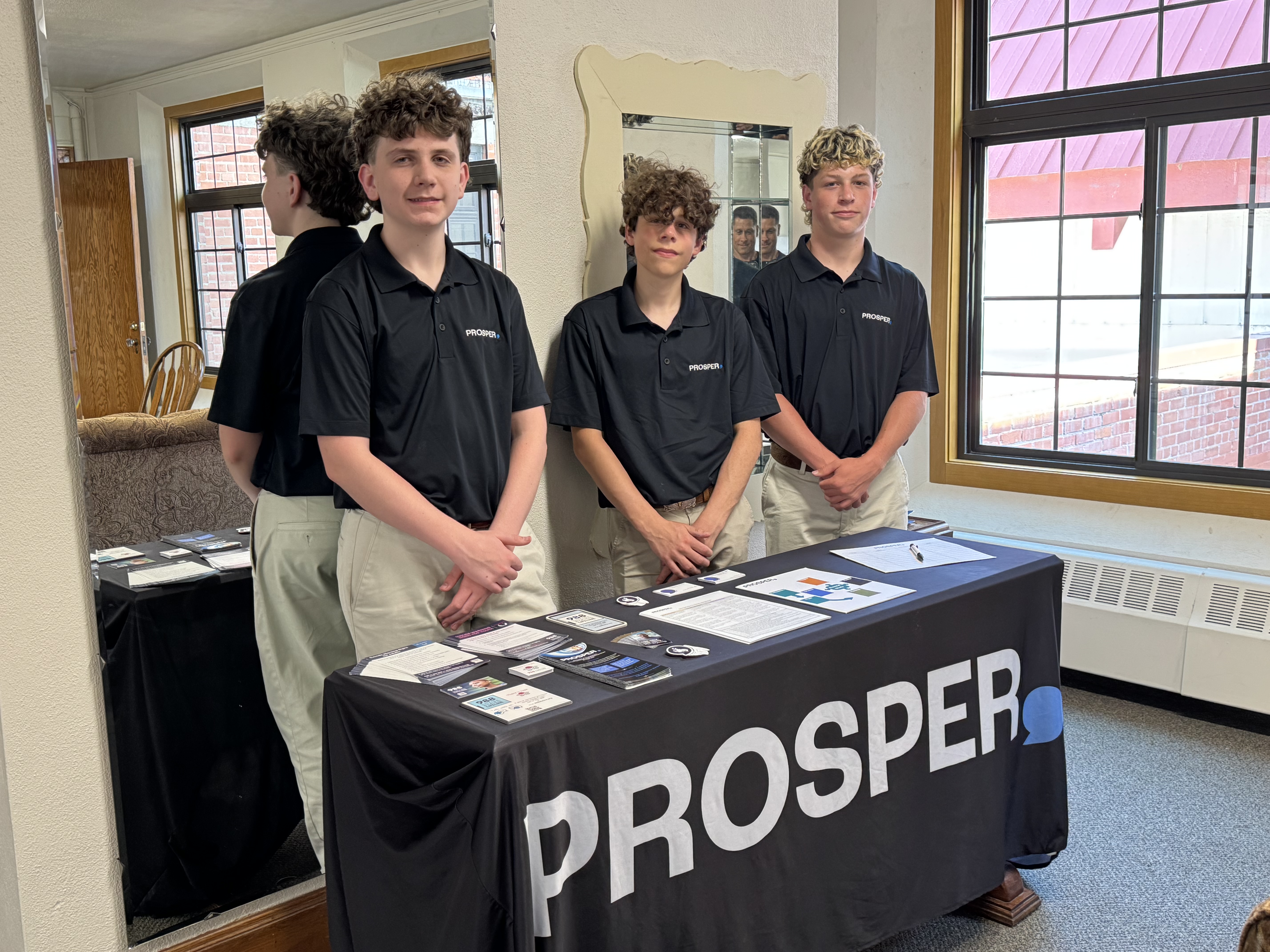 PROSPER interns at a community resource table