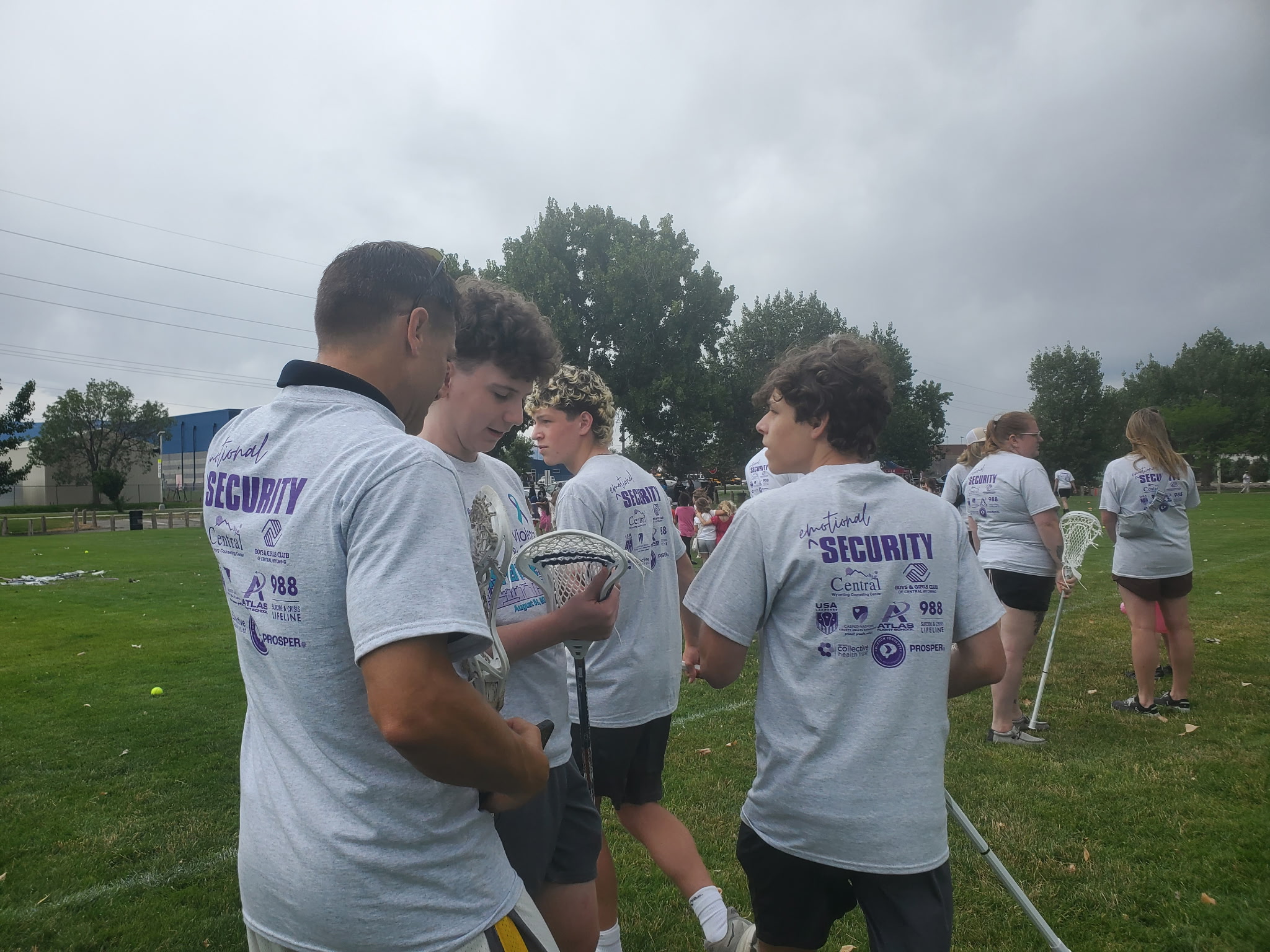 PROSPER interns and community partners together on the lacrosse field