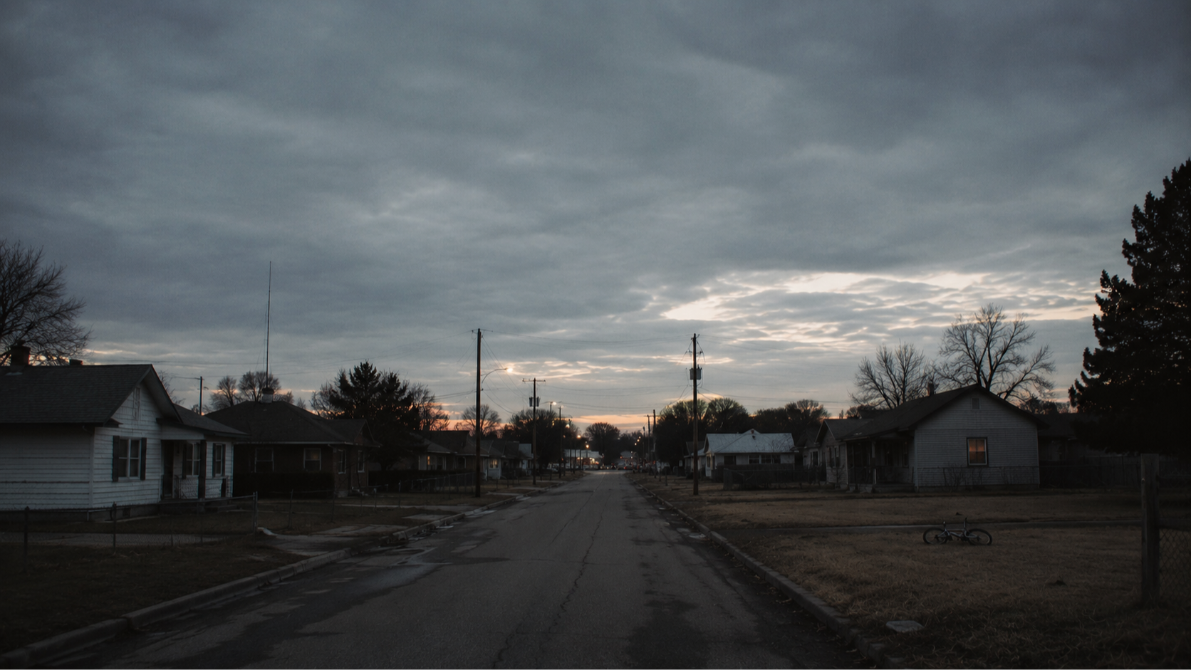 A boy at the ranch at dusk