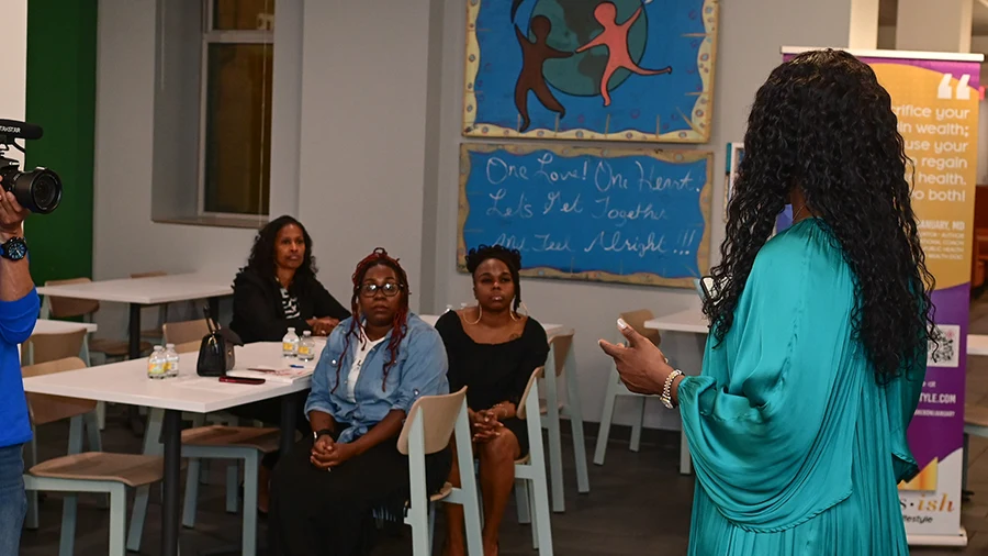 Dr. Eboni January delivering health literacy training to clinicians.