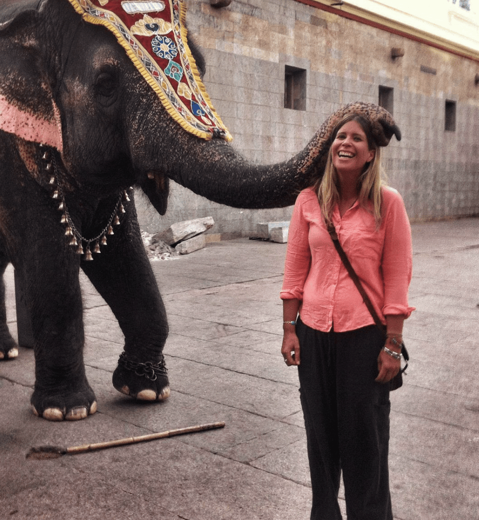 Monique Rhodes with elephant, travel photo