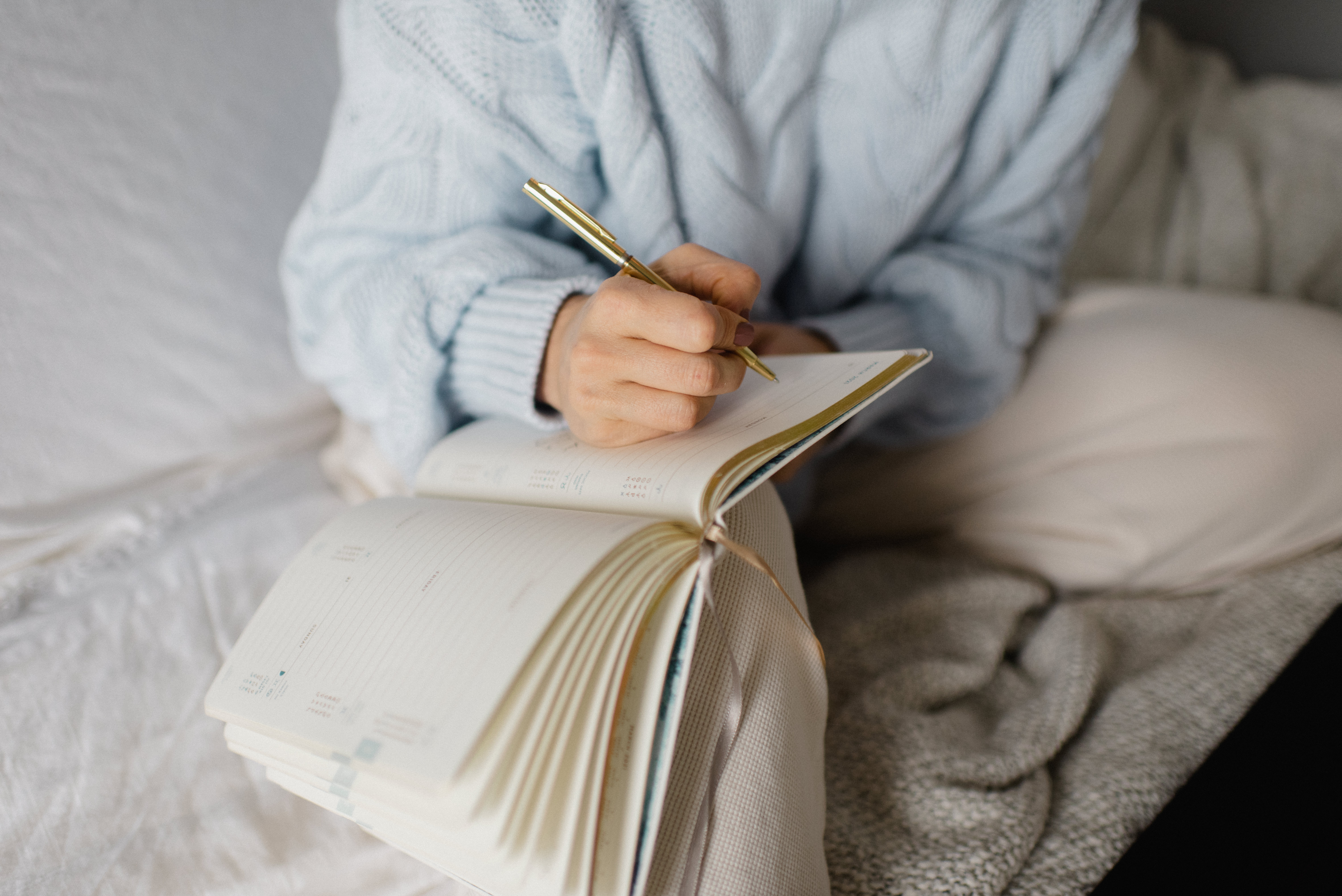 Writing hand and journal for Sacred Threads popup