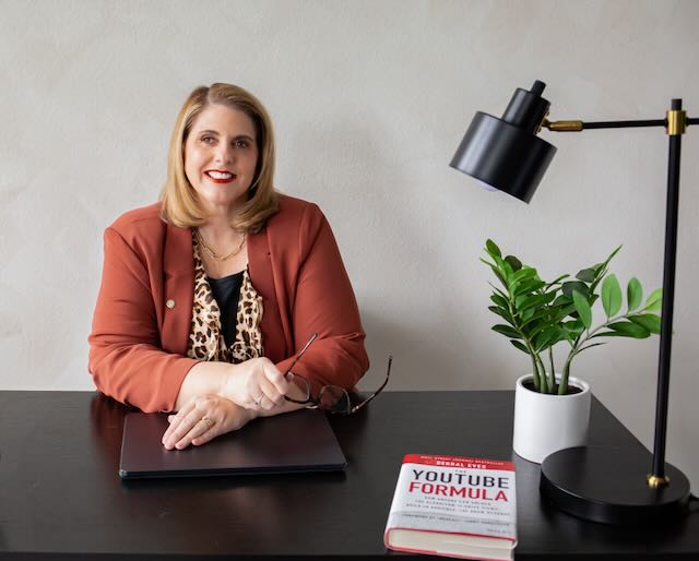Kathy Sizemore at her desk